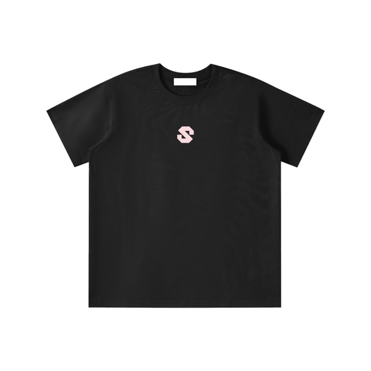 Black t-shirt with a small white logo on a white background