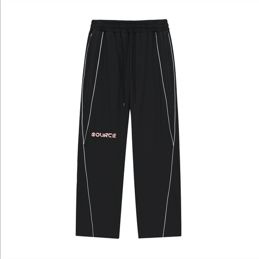 Black pants with white accents and 'SOURCE' branding on a white background