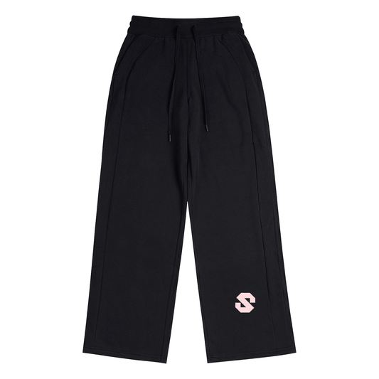 Black pants with a pink logo on a white background