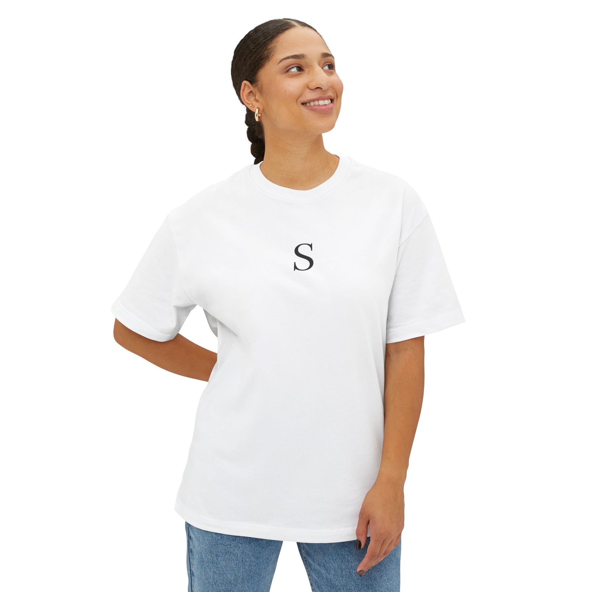 Woman wearing a white t-shirt with a letter 'S' on a white background