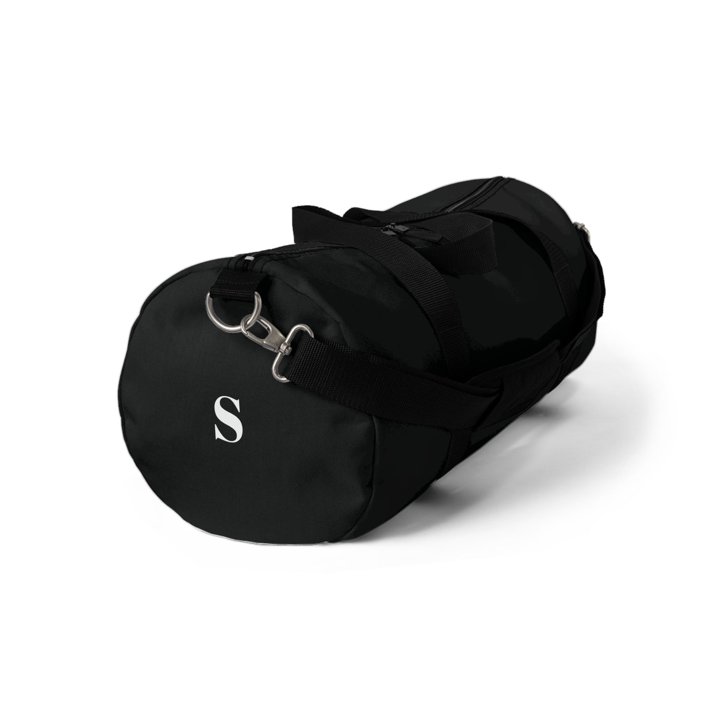 Black duffel bag with a silver clasp on a white background