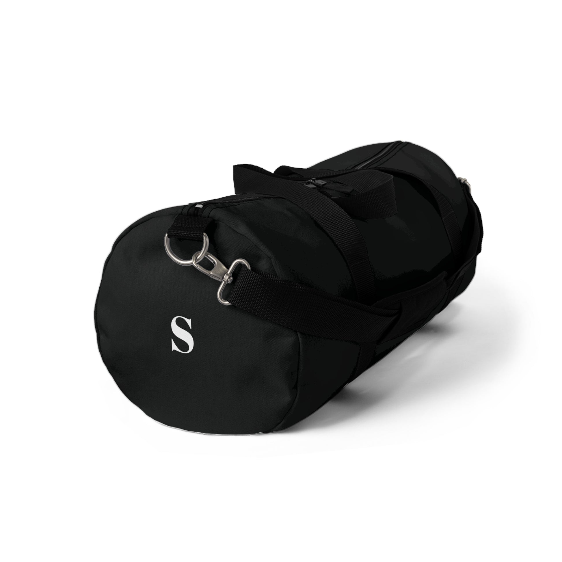 Black duffel bag with a silver clasp on a white background