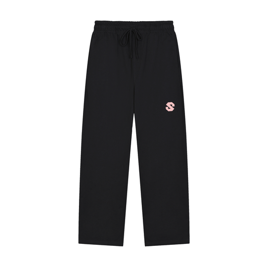 Black pants with a pink logo on a white background