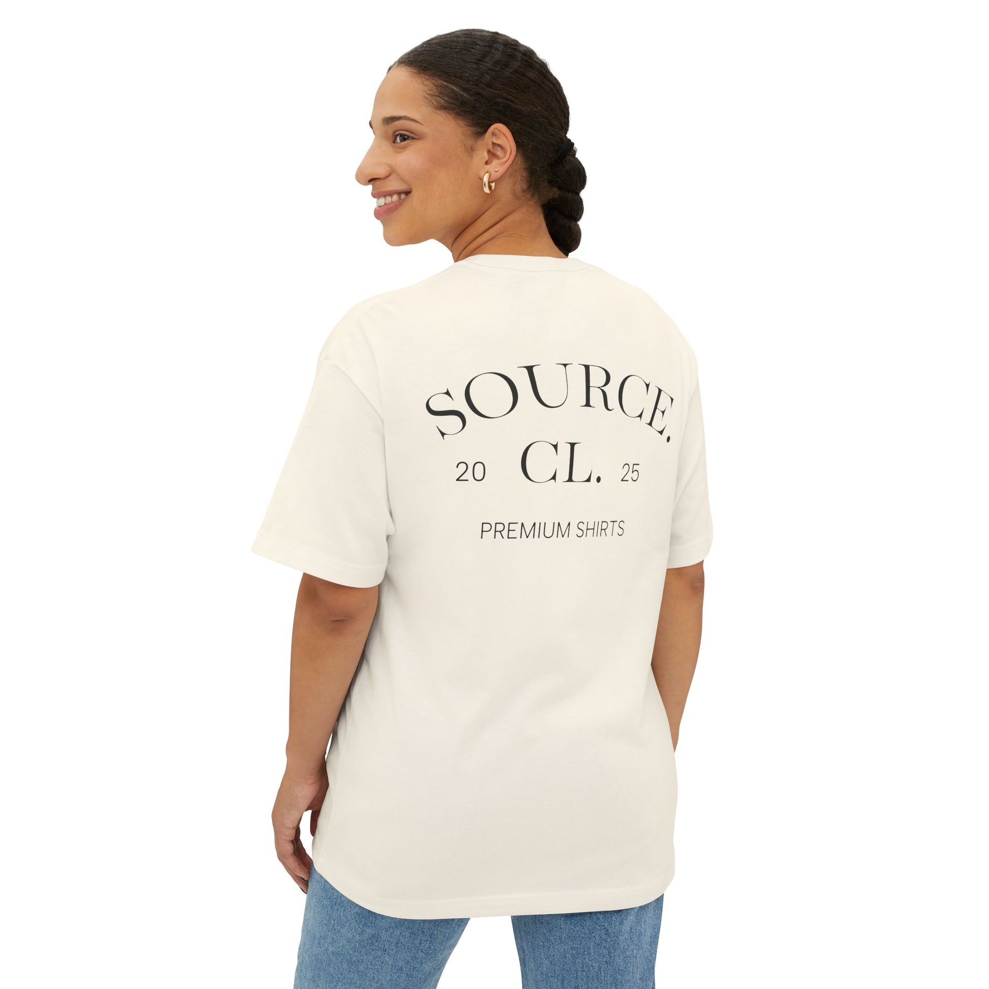 Woman wearing a white t-shirt with 'SOURCE CL' text on the back, standing against a white background