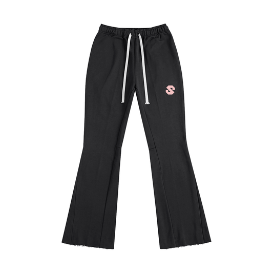Black flared pants with a small logo on a white background